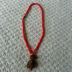 Red and gold beaded necklace